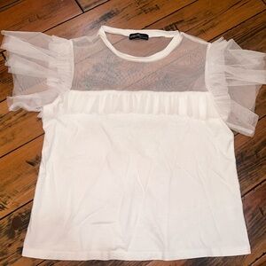 Super cute shirt! Perfect for spring. New, never worn!